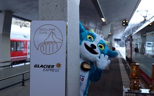  (6'000 x 4'000 px / 920,05 KB) <a href='fileadmin/user_upload/Yodly_and_the_olympic_flame_in_front_of_Glacier_Express_Excellcence_Class.jpg' download class='dlink'>Download Link</a>